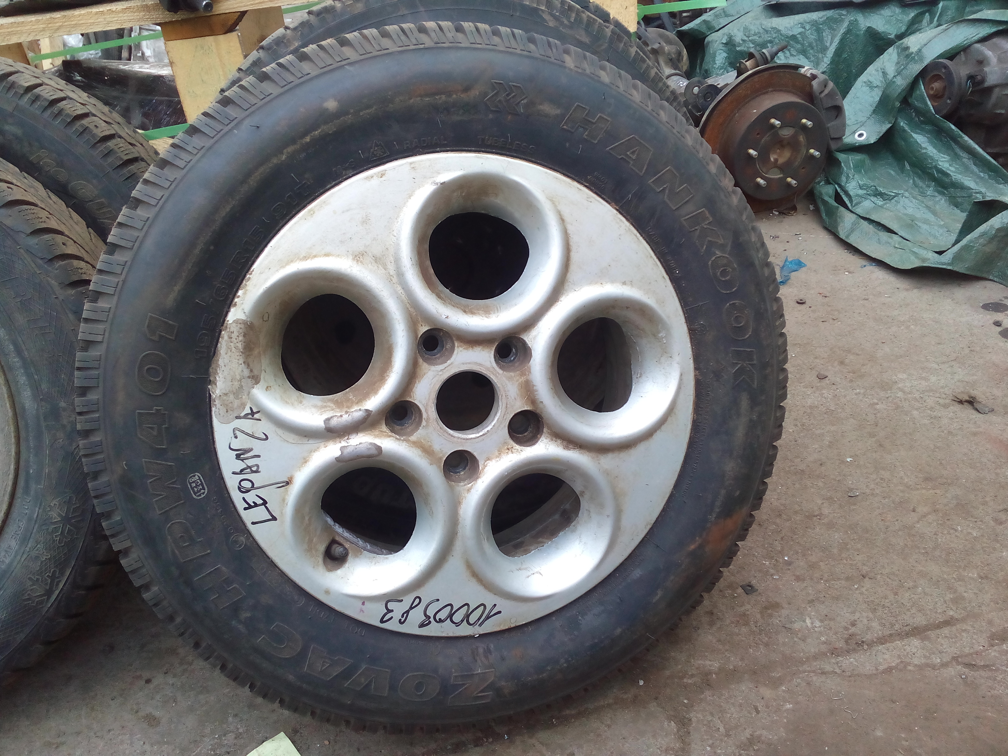 запасное колесо в сборе (R15, новая с шипами) на Daewoo Leganza